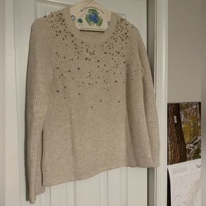 A thick wooly sweater fit with pearls and diver balls!
